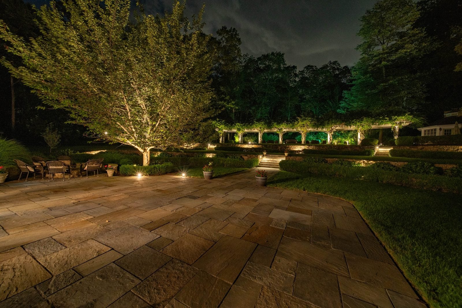 A New Jersey property lit at night by Unique Outdoor Lighting