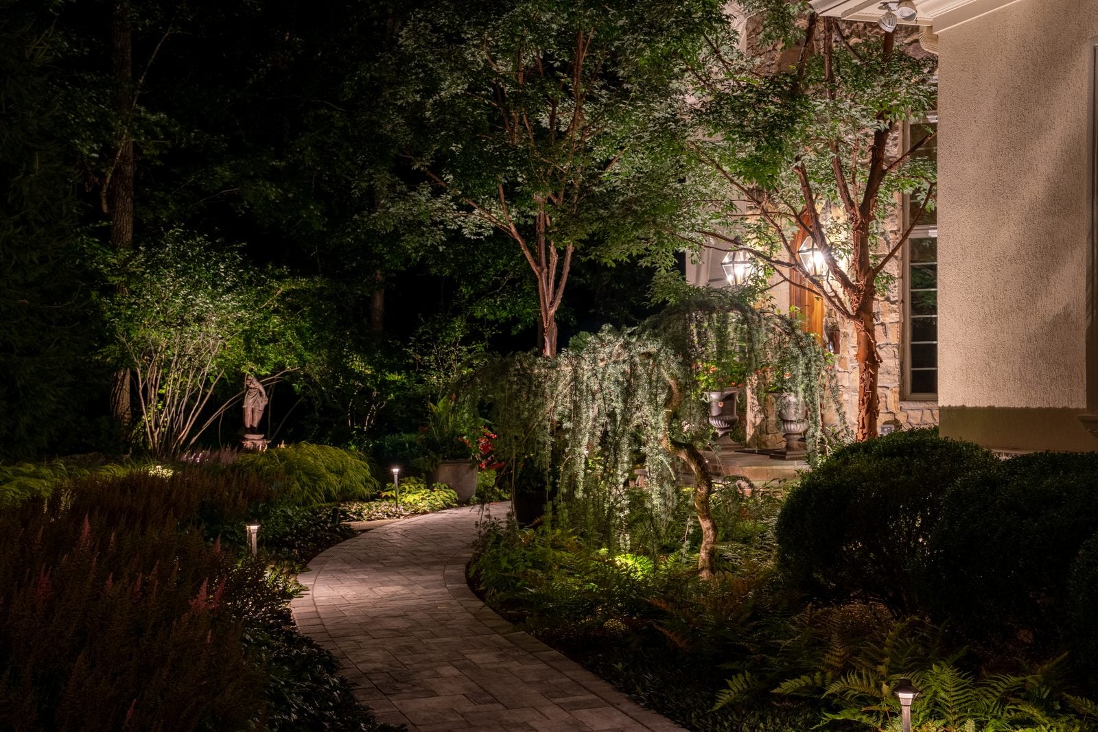 A New Jersey property lit at night by Unique Outdoor Lighting